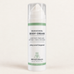 RENATURALS Bakuchiol Body Cream in a white airless pump bottle with a clear cap and sage-and-white label on a warm ivory background.