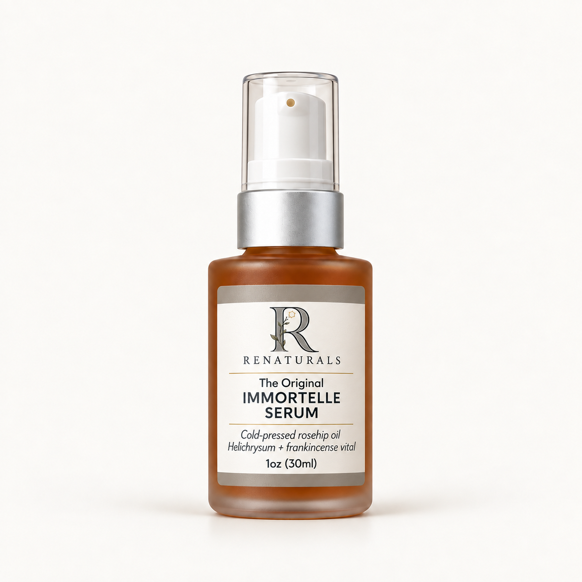 RENATURALS Original Immortelle Serum, 1oz (30ml), in an amber-filled frosted bottle with a white pump, matte silver collar and an ivory, taupe and soft-gold Botanical R label.