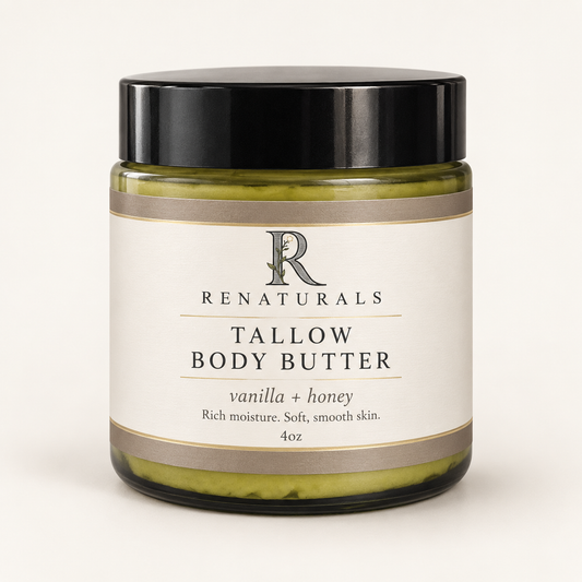 RENATURALS Vanilla + Honey Tallow Body Butter, 4oz, in a green glass jar with a black lid and ivory, taupe and gold-trim Botanical R label on an ivory background.