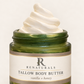 Close-up of creamy ivory whipped Tallow Body Butter in a green glass jar with the RENATURALS Botanical R label and soft gold trim.